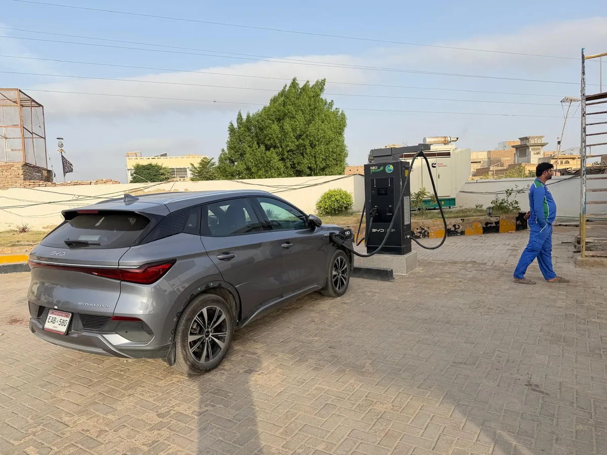 The grey BYD Atto 3 plugged into a HUBCO Green DC charger at Hyderabad